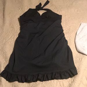 Black swimsuit dress like . Very flattering . Good condition . Size extra Lg .